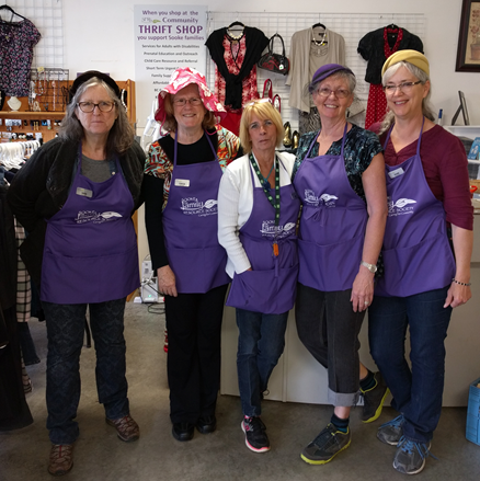 Five ladies pose at the thrift job